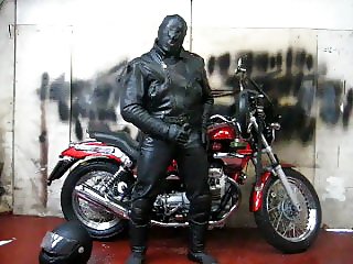 leather and rubber masked motorcycle wank