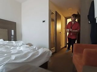 Caught naked in hotel room by maid