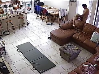 Horny wife bent over couch (hidden camera)
