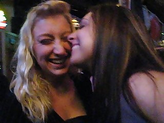 Straight college girls kissing at the bar