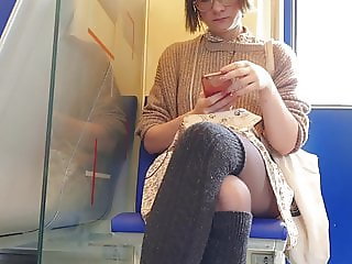 Nerdy girl crossed legs pantyhose on train