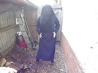 Burqa and pantyhose in the rain