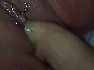 Fisting pierced wet pussy