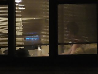 neighbor lotion up window voyeurizing