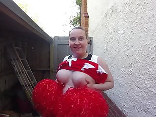 Chubby cheerleader in the yard