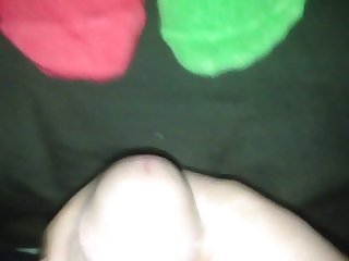 Cumming on holiday  red and green socks
