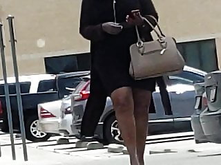 Thick ebony lady wearing skirt