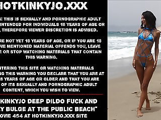 Hotkinkyjo deep dildo fuck and belly bulge at public beach
