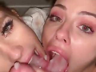 Cock-crazy sluts sharing a facial and cum kissing each other